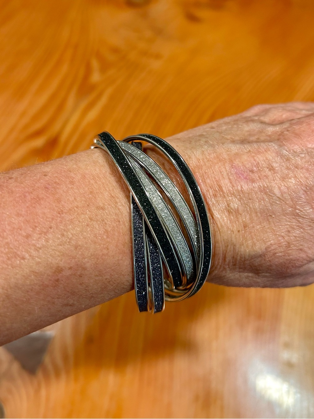 Stacked Interconnected Bangles in Black and Silver
